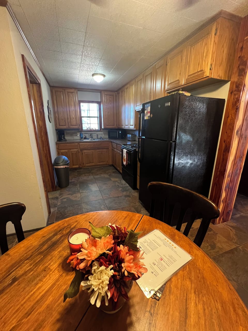Table and 4 chairs inside kitchen 