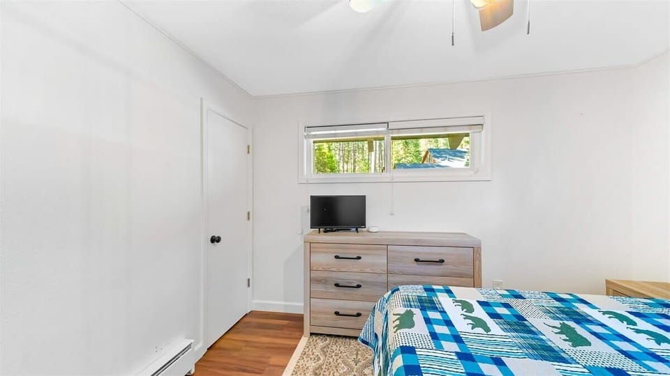 This bedroom also has a T.V.
