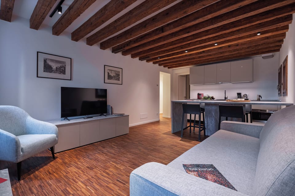 Superior Apartment | Living area | Flat-screen TV