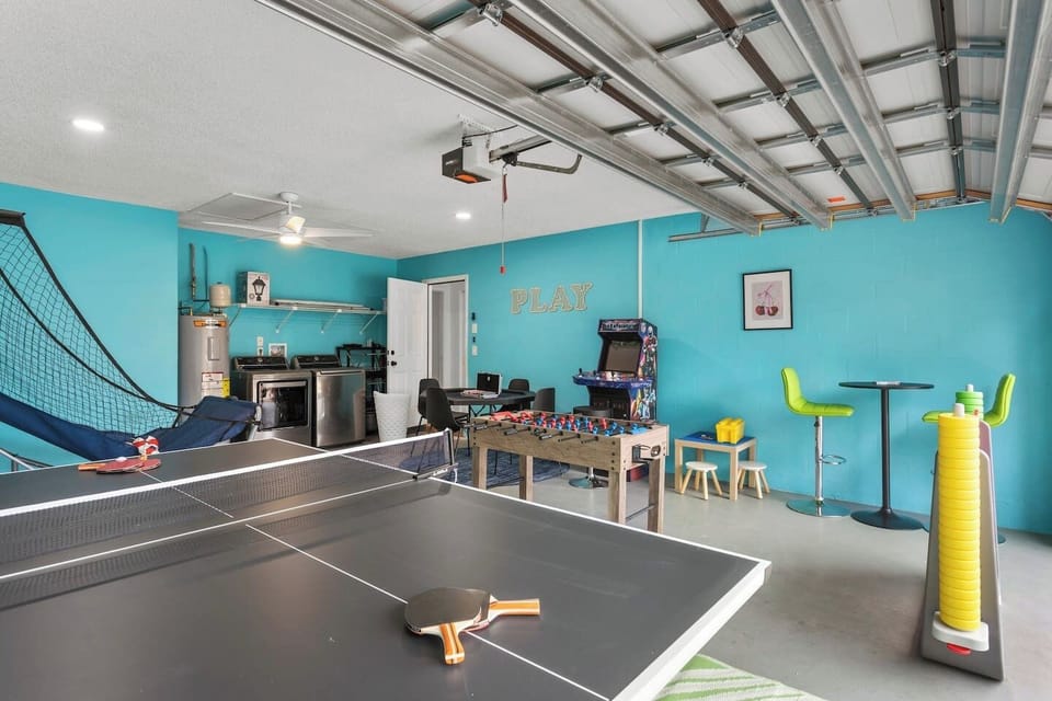 A full game room built for nonstop fun - ping pong, fooball, basketball, NFL blitz, poker table, life sized connect 4, and even a custom lego table for kids!