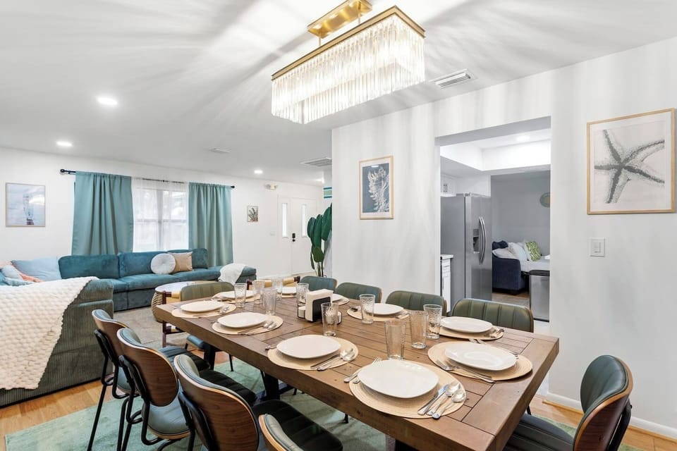 Everyone sits and eats together at the dining table for 10!
