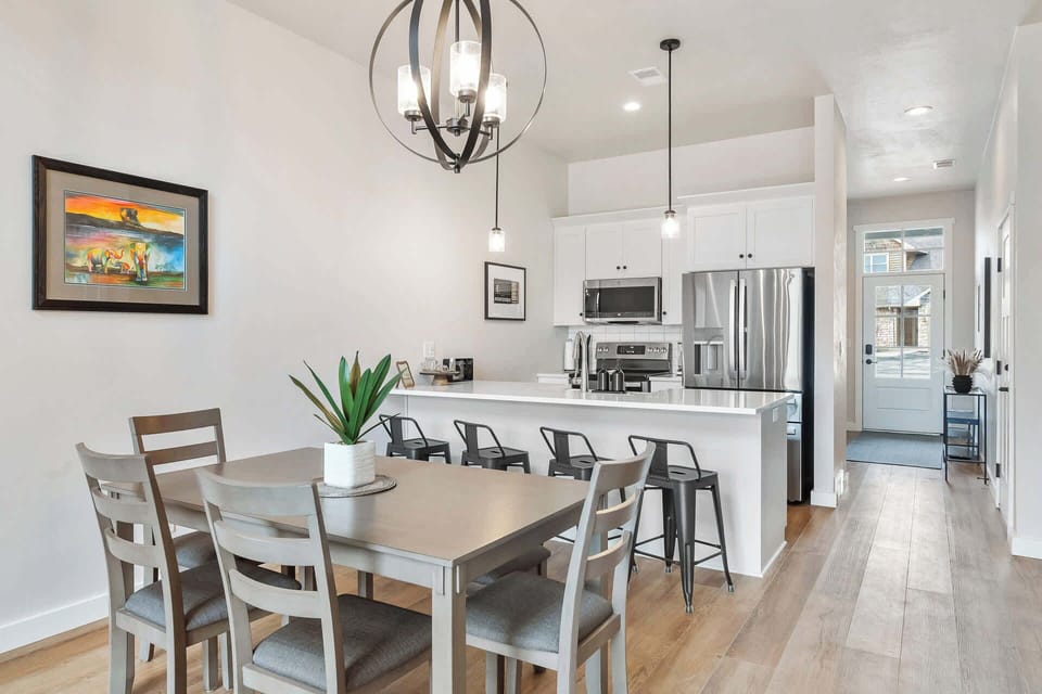 Breakfast bar seating for 4 and dining table seating for 6