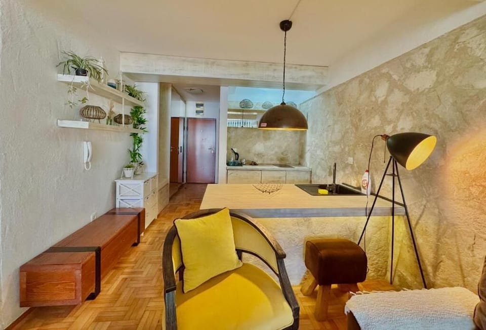 Comfort Studio, Balcony, Sea View | Living area | 40-inch LCD TV with digital channels