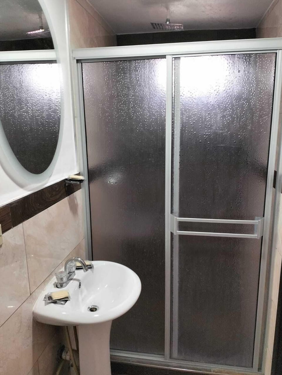 Shower, towels, soap, shampoo