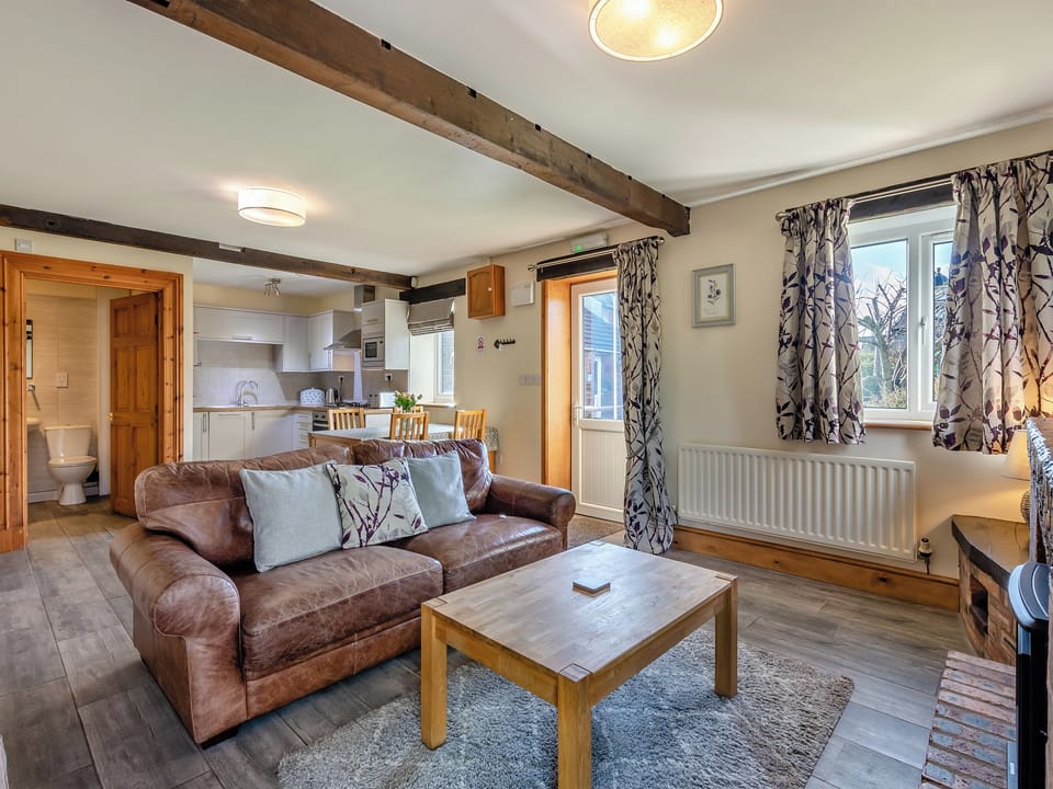 Open plan living space | Milking Parlour - Dickinson Place Holiday Cottages, Allonby