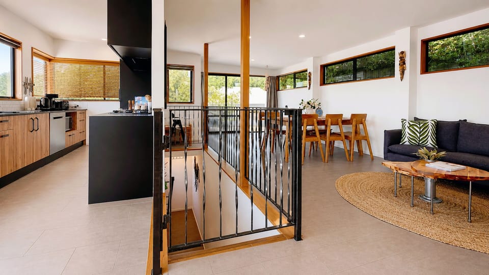 Light-filled open-plan living with a family-friendly safety gate