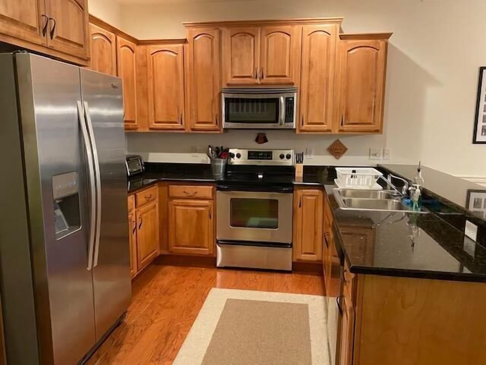 Townhome, Multiple Beds, Balcony, Garden View | Private kitchen | Coffee/tea maker