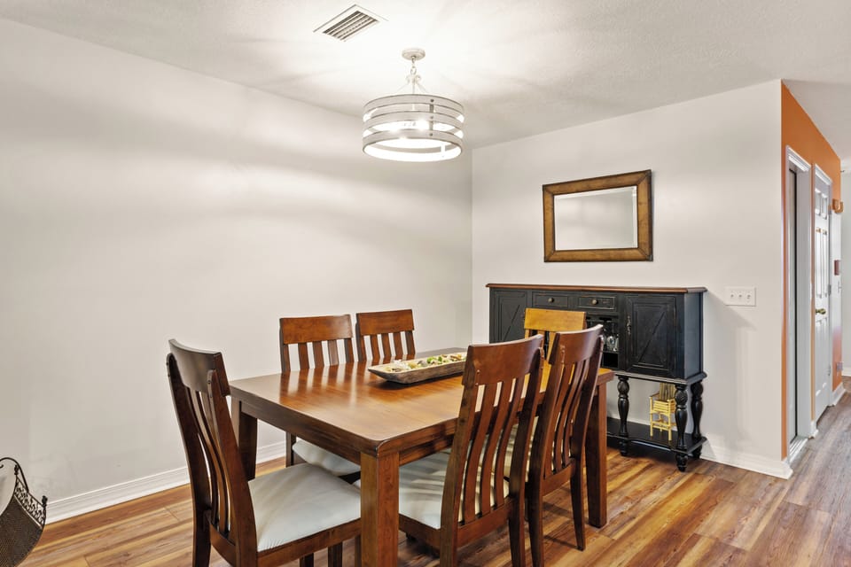 Dining room table with seating for 7.
