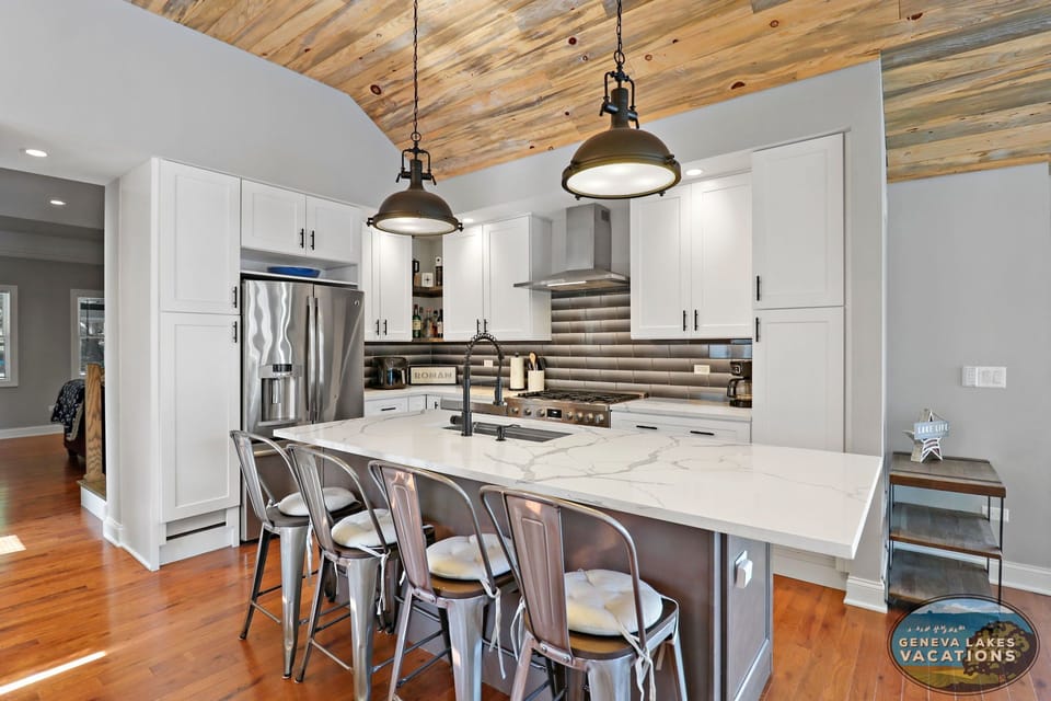 Island seating in spacious kitchen.