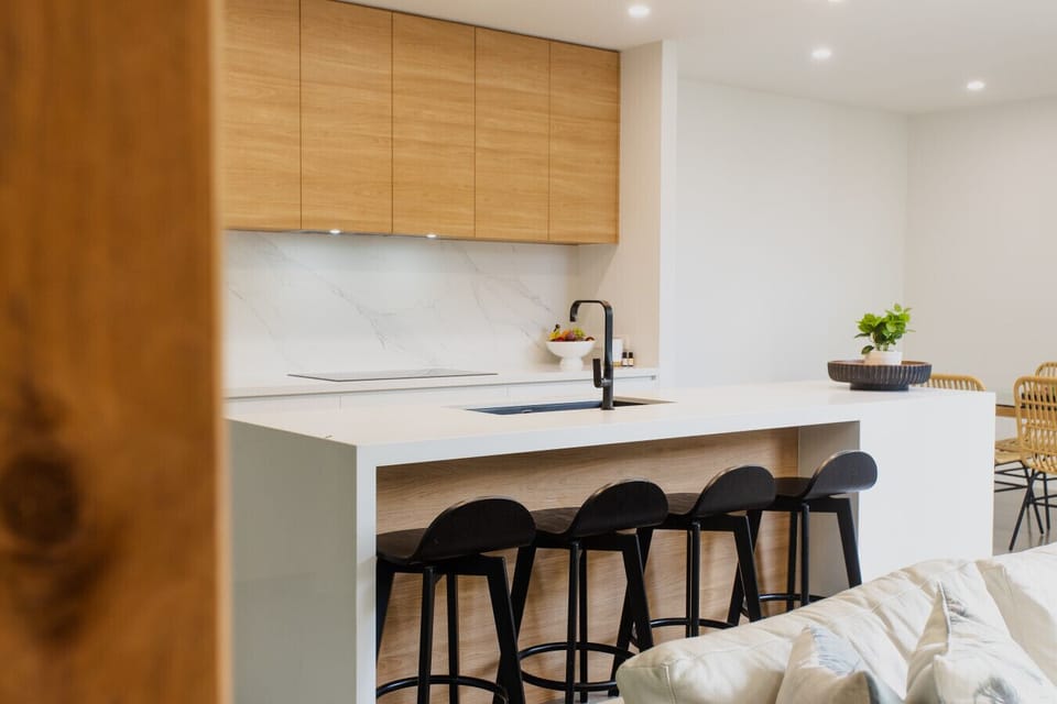 Contemporary kitchen with spacious island and stylish cabinetry  Best pick: