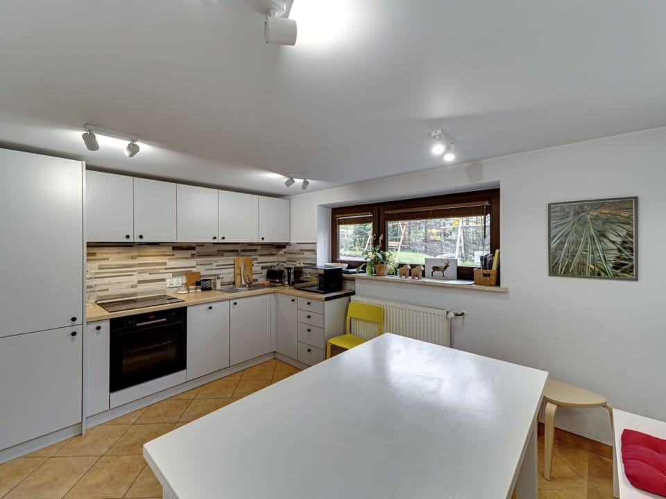 Kitchen, Countertop, Interior Design, Kitchen Appliance, Flooring, Furniture, Wood, Ceiling, Major Appliance, Cabinetry