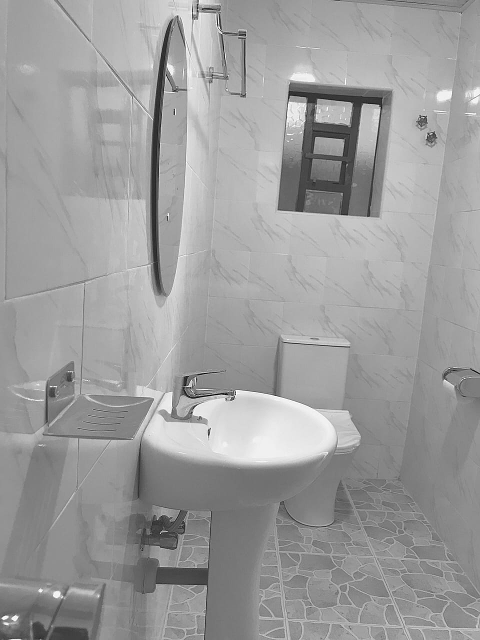Shower, rainfall showerhead, towels