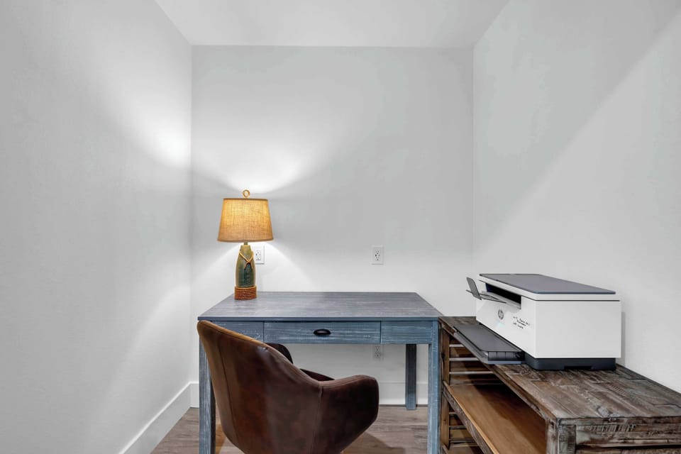 Desk area with printer for catching up on work in Bedroom 2
