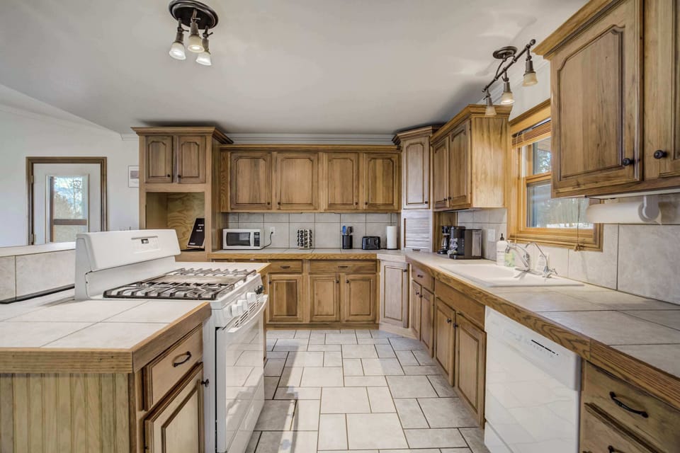 A fully equipped kitchen with ample storage, modern appliances, and everything you need to prepare delicious meals.