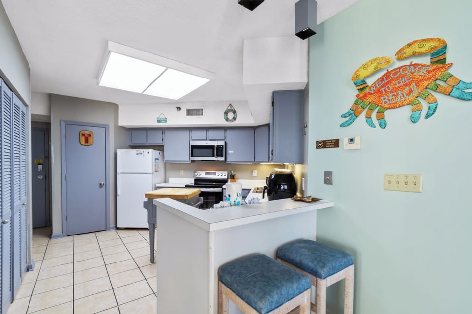 Signature Condo, 3 Bedrooms, Balcony, Beachfront | Private kitchen | Fridge, microwave, oven, stovetop