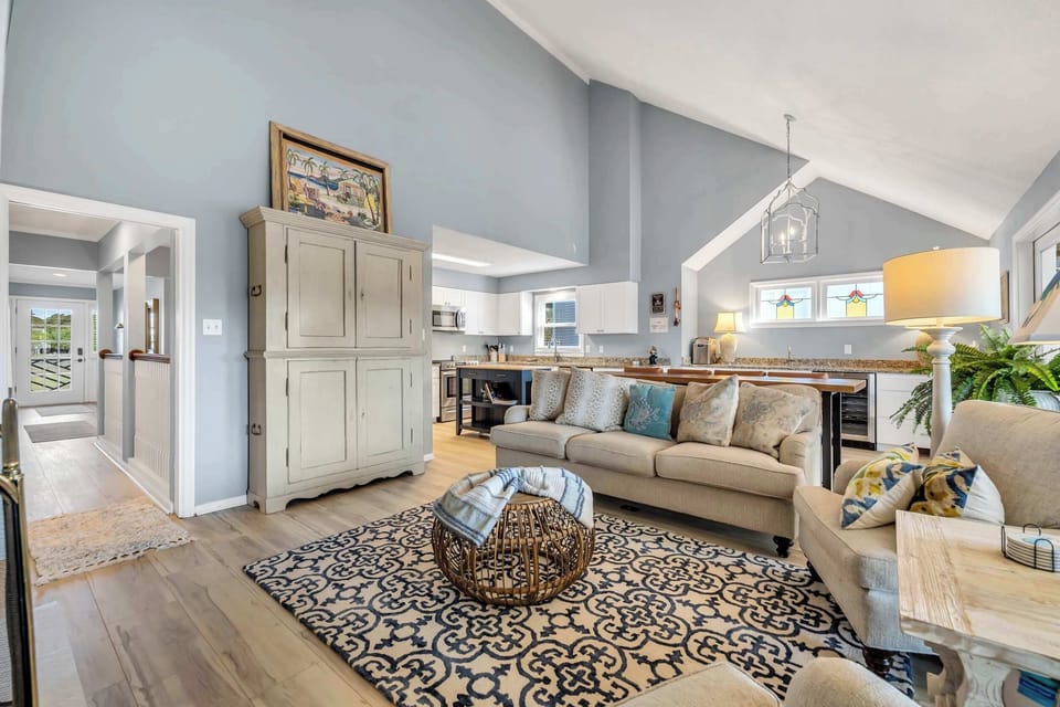 Spacious, seamless, and stylish — our open-concept living room is perfect for making memories together.