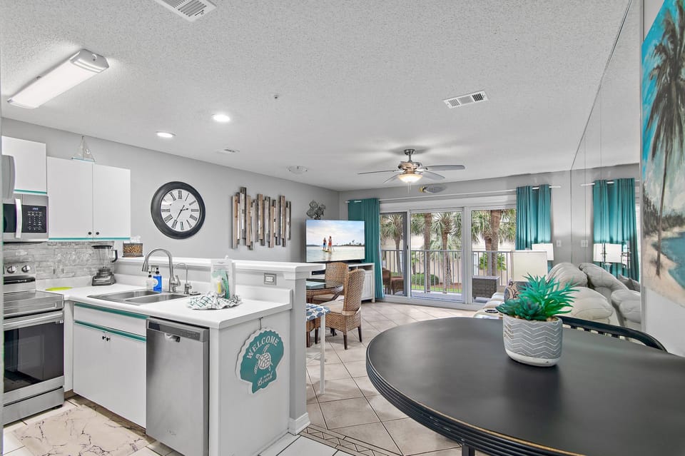 The kitchen opens to the dining area for easy entertaining.