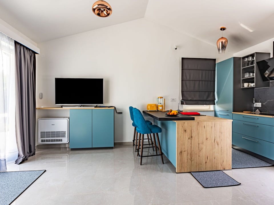 Furniture, Interior Design, Flooring, Wood, Floor, Cabinetry, Ceiling, Kitchen, Countertop, Room