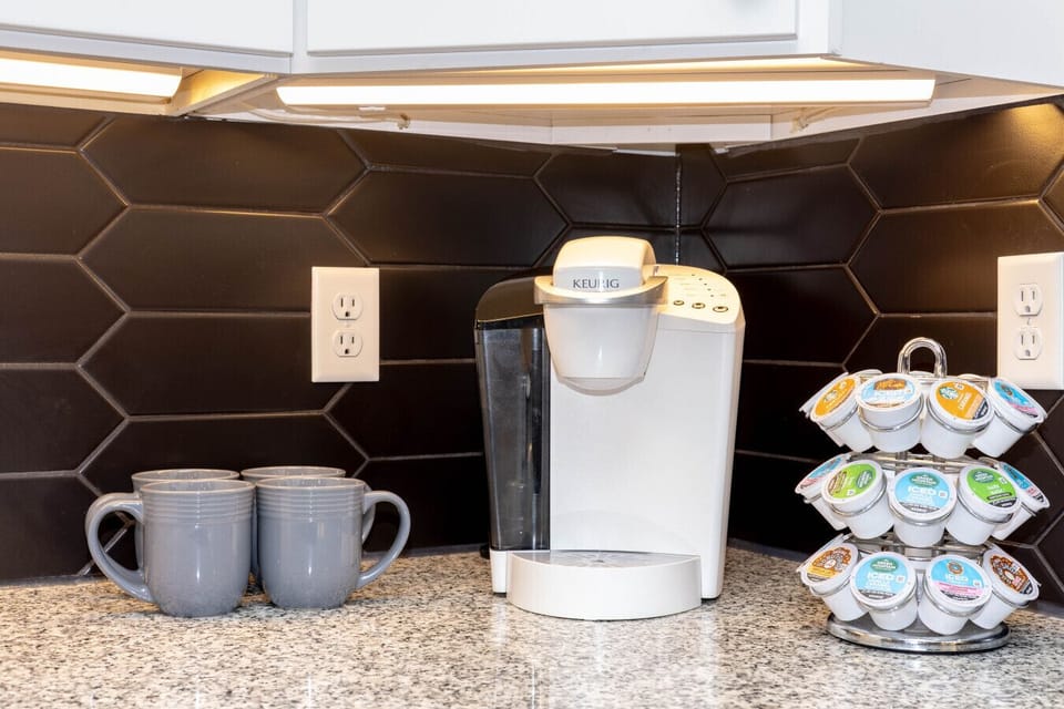 Fuel up for a day of exploring with our fully stocked Keurig coffee station! ☕✨