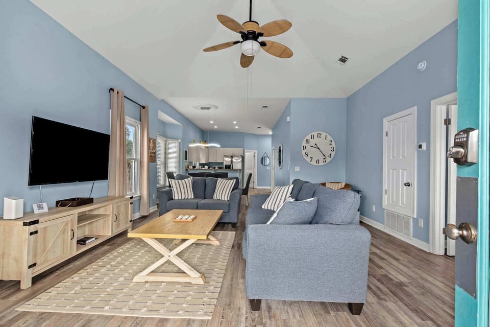 Our living room area is modern meets beachy!