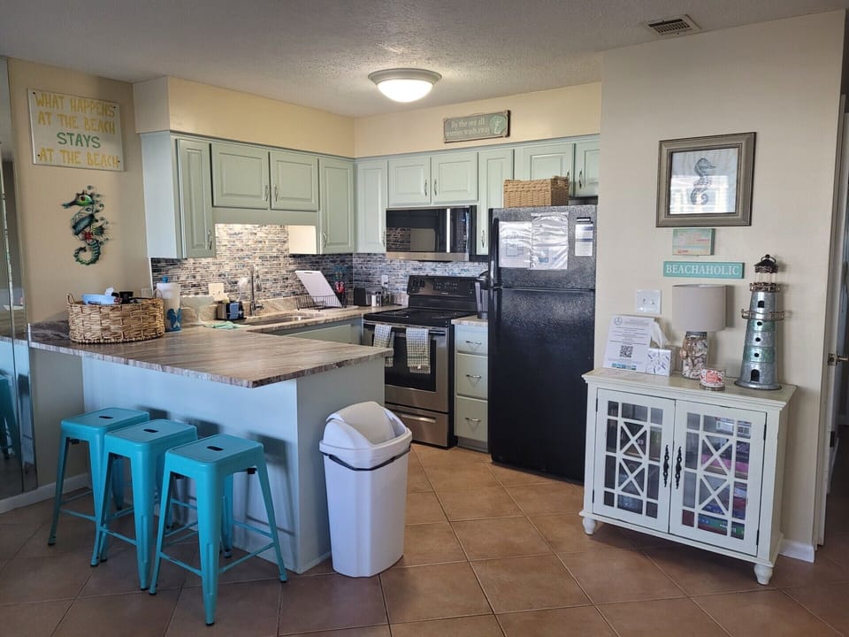 Newly repainted kitchen with new LG microwave