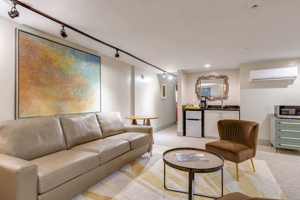 Studio with sofa sleeper, king bed, TV, and kitchenette 