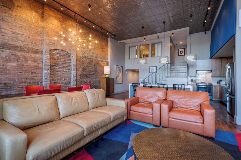 Enjoy the stylish industrial decor with an open-concept design and modern amenities