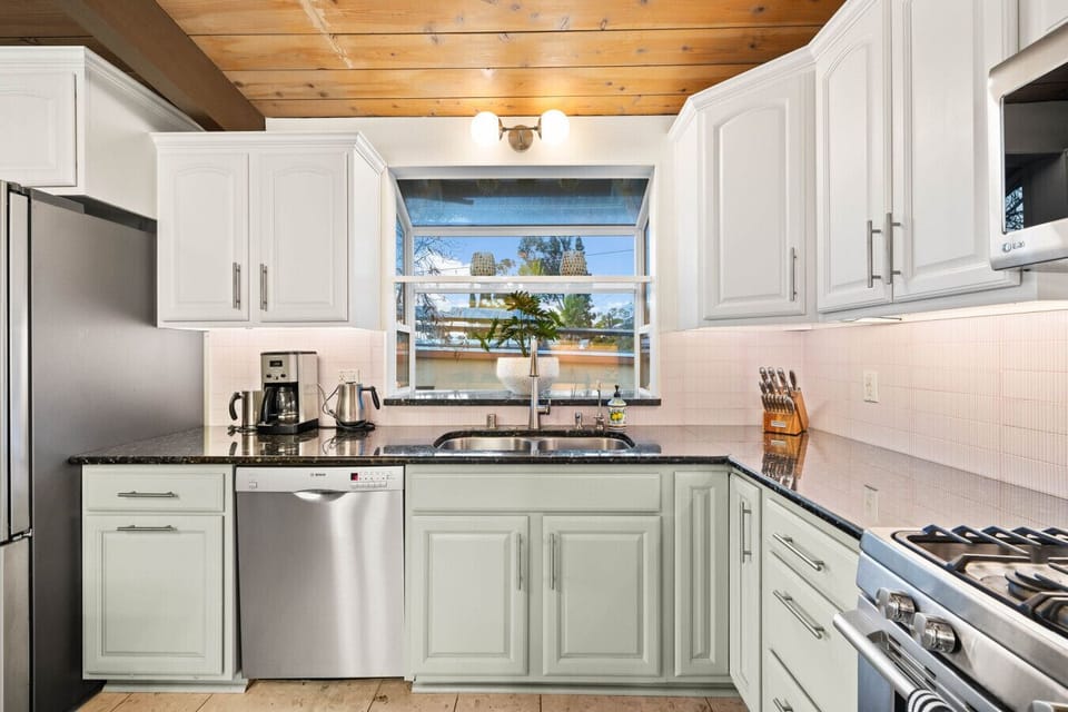 This kitchen offers a functional layout and all the essentials for cooking