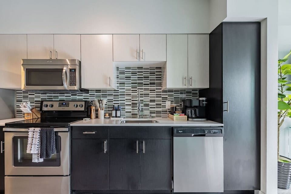 Stainless steel, modern appliances | Stocked coffee station with coffee grounds and Kuerig pods
