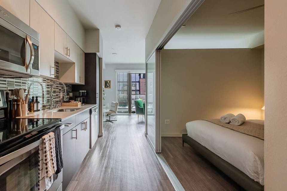Enter your top floor spacious apartment suite!