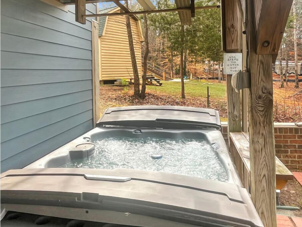 Hot Tub Retreat:  Unwind in the bubbling hot tub. 
