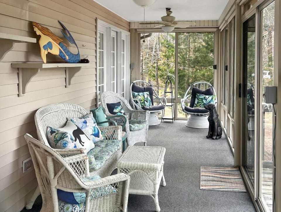 Sunroom Retreat:  Bright and airy, perfect for morning coffee.