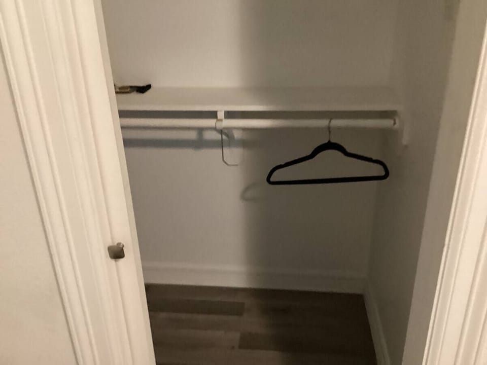 Closet in restroom of master bedroom