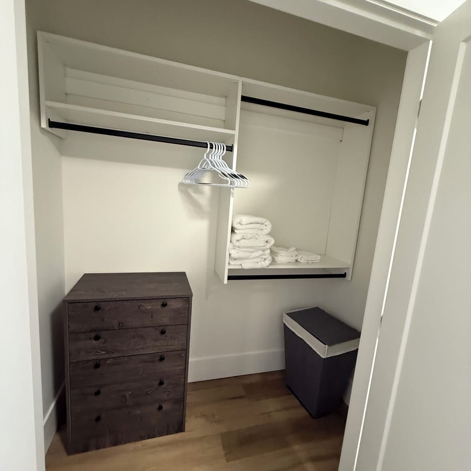Bedroom closet. Guest towels are placed here for your stay