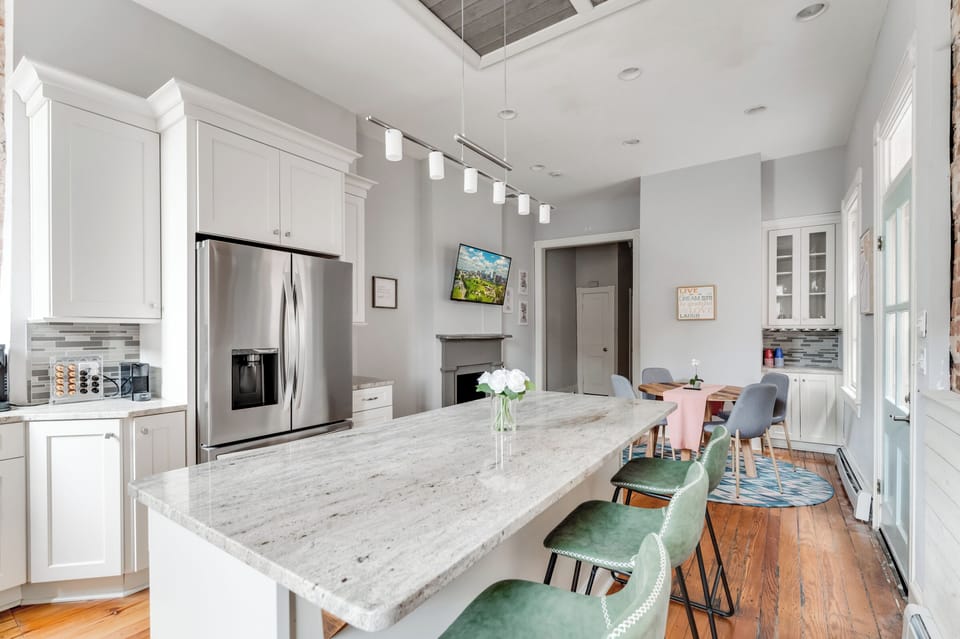 Fully-Equipped Kitchen: Whip up culinary delights in this bright, modern space with ample seating!