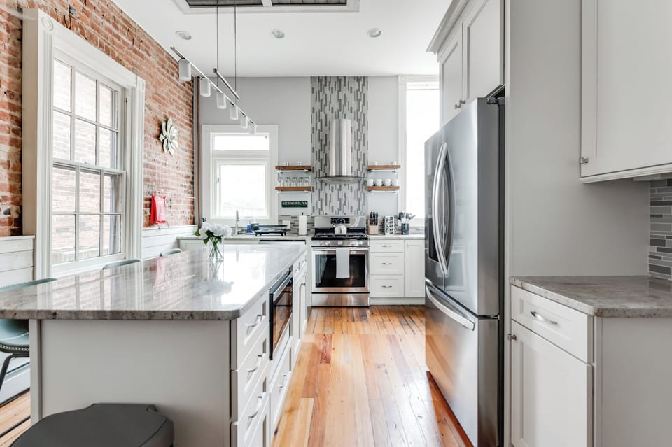 Kitchen: Whip up culinary delights in this stylish, sunlit oasis with vintage charm!