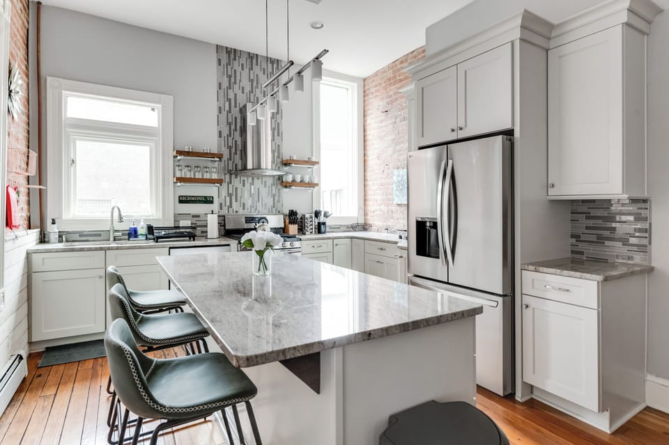 Gourmet Kitchen: Enjoy culinary adventures with modern appliances and chic bar seating!