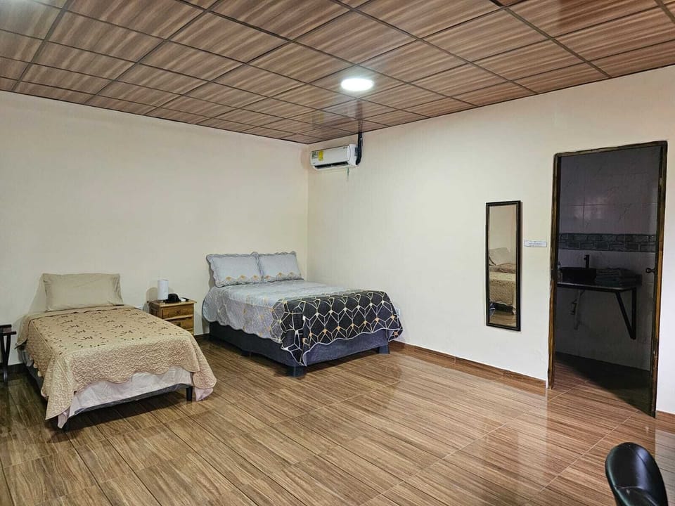 Deluxe Double Room, 2 Double Beds, Patio | Iron/ironing board (on request), WiFi (free)
