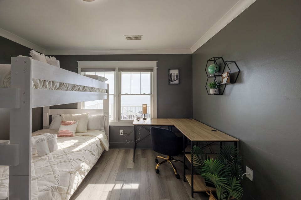 Family‑friendly third bedroom with Smart TV and thoughtful touches to ensure a restful night's sleep for every guest.