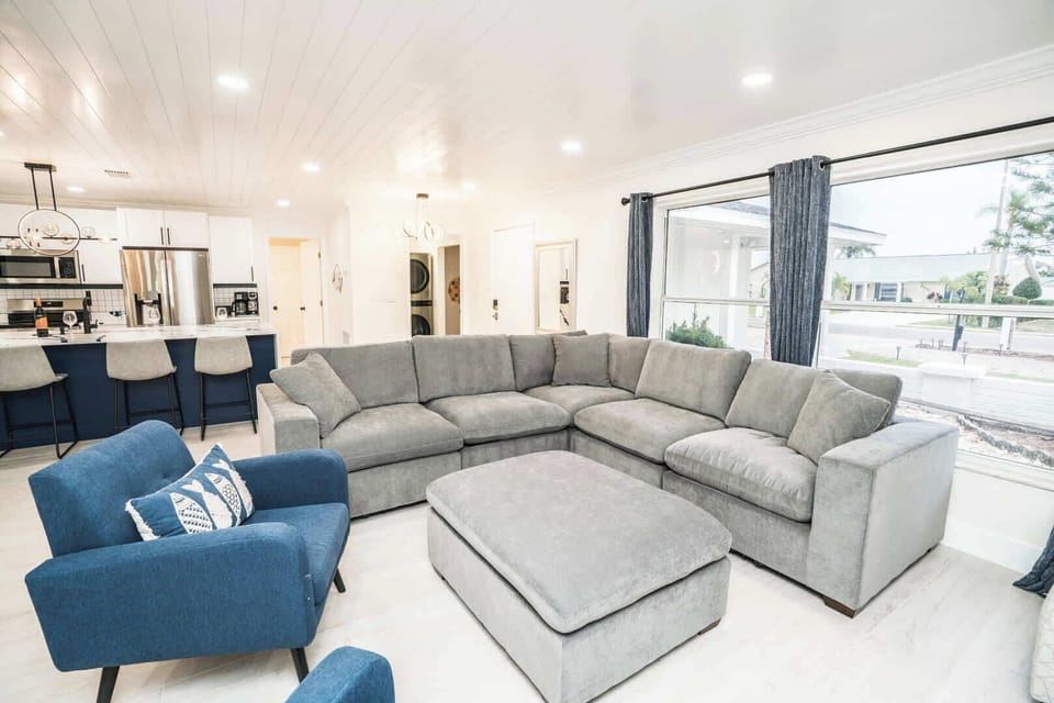 Our spacious living room features a large plush sofa for ultimate comfort.