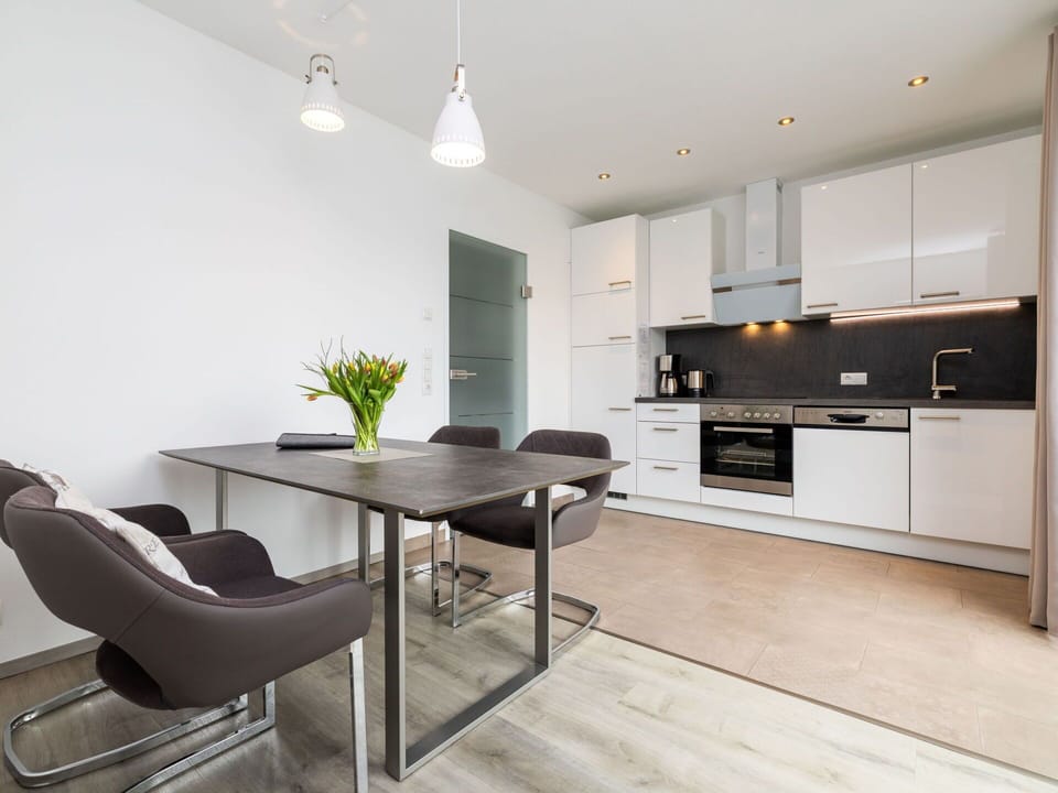 Furniture, Interior Design, Flooring, Ceiling, Wood, Floor, Kitchen & Dining Room Table, Light Fixture, Table, Chair