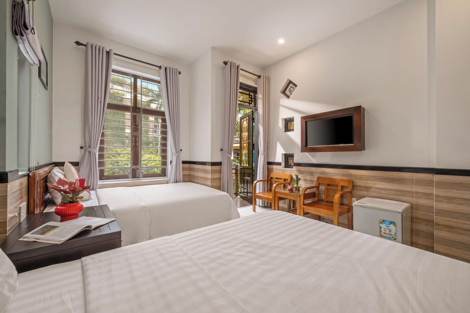 Deluxe Triple Room, Balcony, Garden View | Garden view