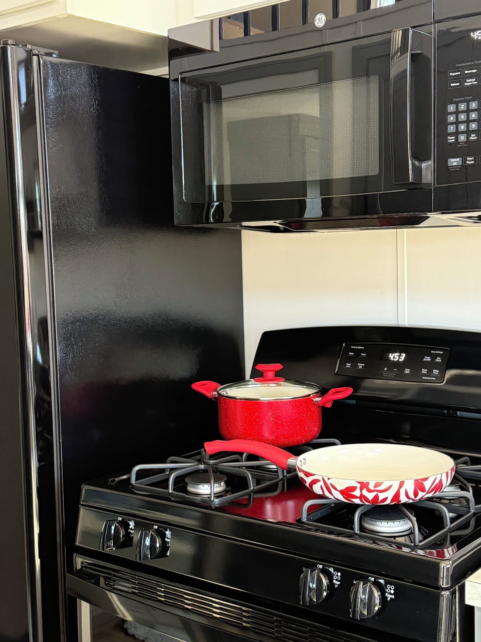 gas range, built in microwave, side by side fridge, ice maker/water dispenser