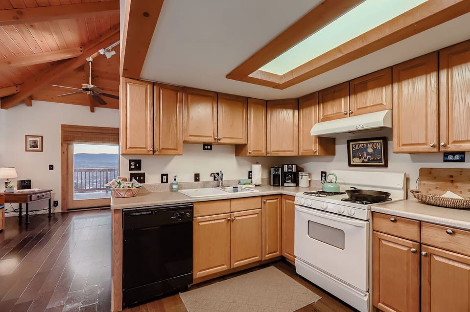 Kitchen with Pod and Drip Coffee, dishwasher over, stove and fridge