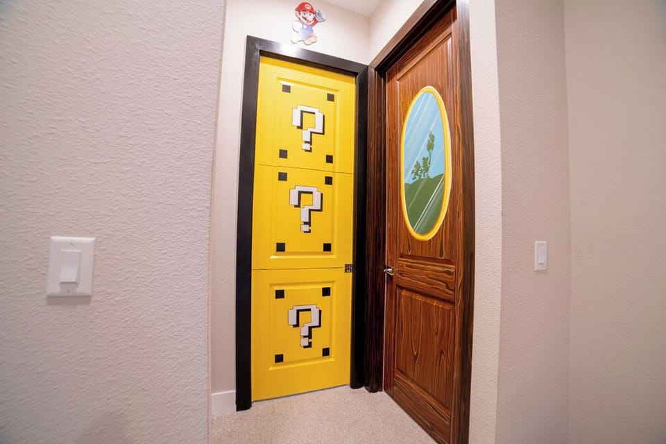 Excitement brews as you decide to enter the Super Mario or Mickey's room first.