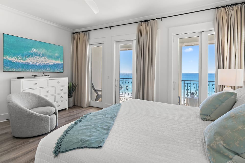 Spacious Master Bedroom (3rd Floor) with King Bed, 65" Smart TV, Gulf Views, Private Balcony, Bathroom with dual vanity, soaker tub & walk-in shower