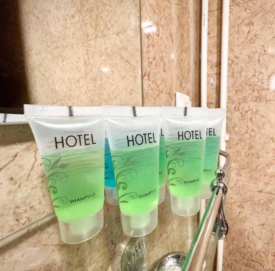 Hair dryer, towels, soap, shampoo