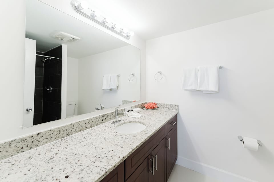 Private en-suite bathroom for added comfort and convenience