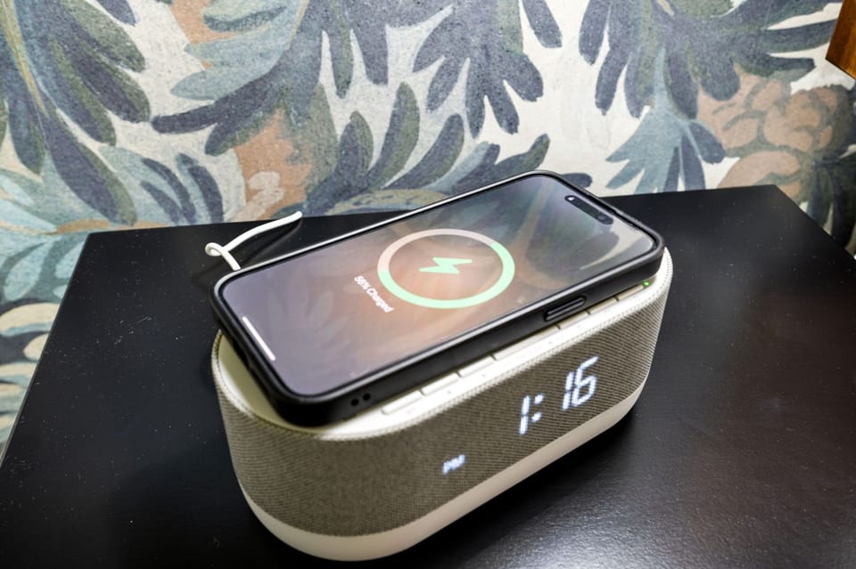 Wireless charger and alarm clock included in both bedrooms.