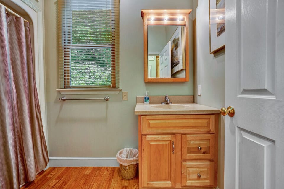 The main level bathroom has everything you need for a comfortable and refreshing experience.
